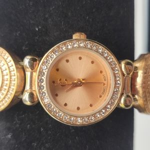 Pretty womens watch new batteries. I don't know the brand